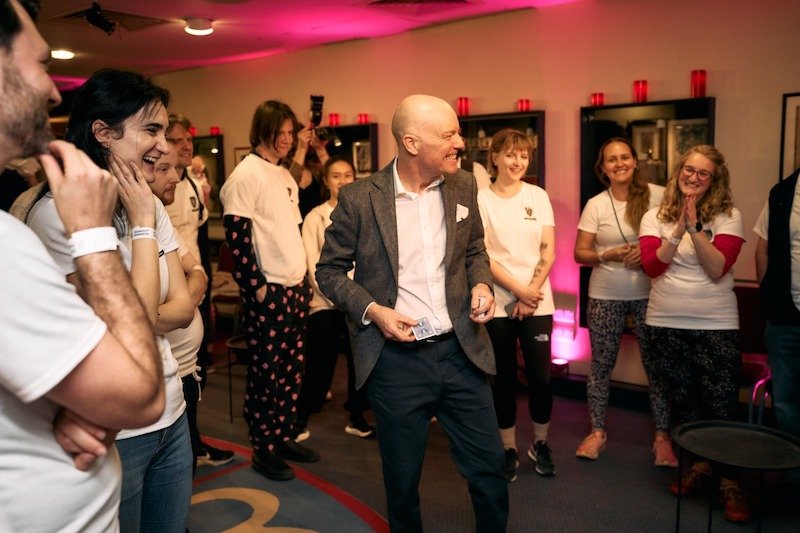 Magician Darren Delaney performing at a fancy-dress party