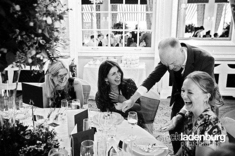 Darren Delaney performing magic at the tables at a dinner party
