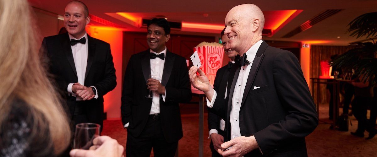 8 reasons why you should book a magician for your corporate event - header image