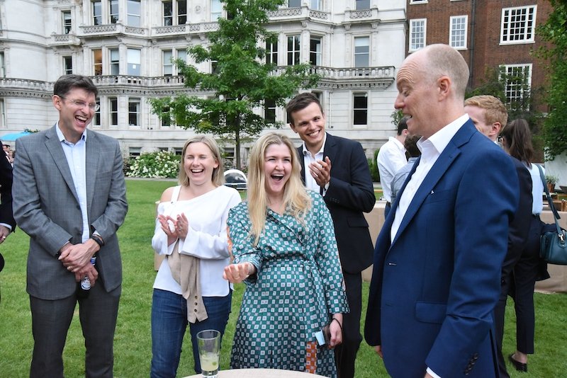 8 Great reasons to book a magician for your corporate event 11 magician Darren Delaney performing close-up magic at corporate summer party
