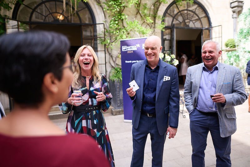 Magician Darren Delaney performing close-up magic at The PayTech awards 2024