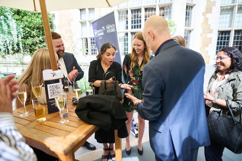 Magician Darren Delaney performing close-up magic at The PayTech awards 2024