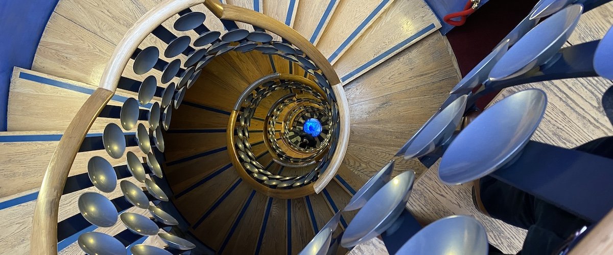 The iconic staircase that greats you when you go to see close-up magic at The Magic Circle.