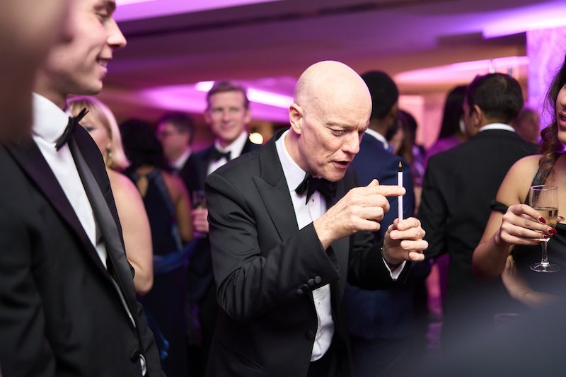 Close-up Magic at The Banking Tech Awards 2024 7 Magician Darren Delaney performing a magic trick with a pen at the Banking Tech Awards 2024