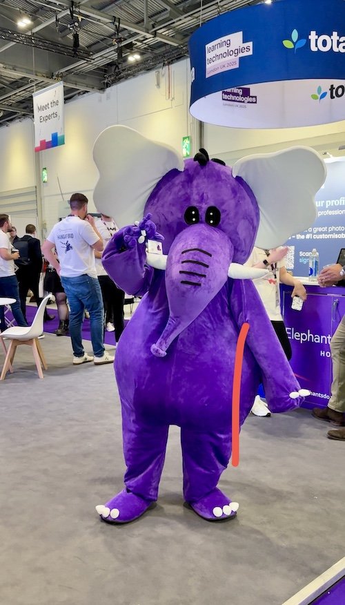 A person dressed as an Elephant on a stand at Learning Technologies 2025