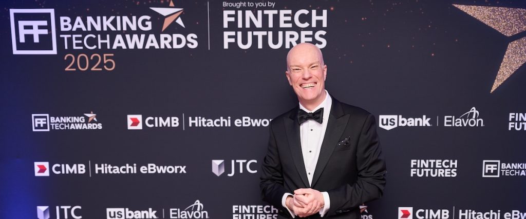 Magician Darren Delaney wearing black tie at the Banking Tech Awards 2025