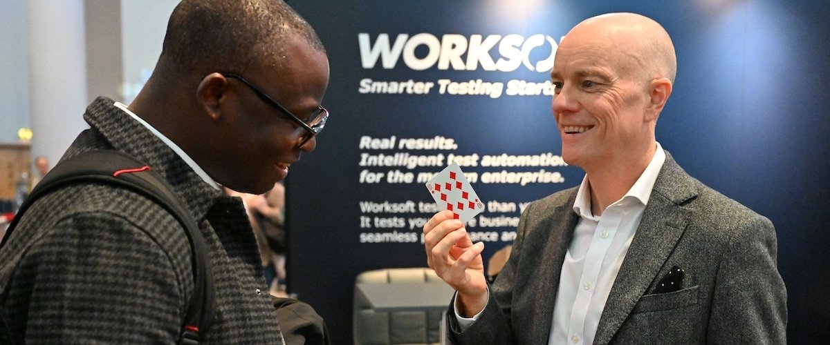 Darren Delaney performing magic on Worksoft's exhibition stand at UKISUG Connect in Birmingham