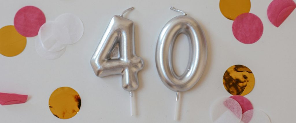 2 candles spelling out 40. One of may ideas for a 40th birthday party