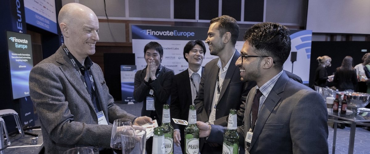Darren Delaney performing close-up magic at Finovate Europe 2026