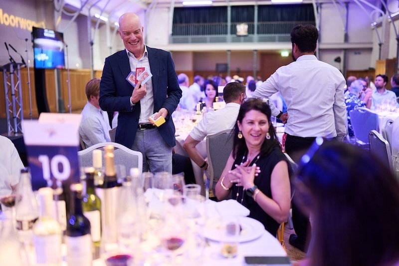 Darren Delaney performing table magic at a corporate awards dinner